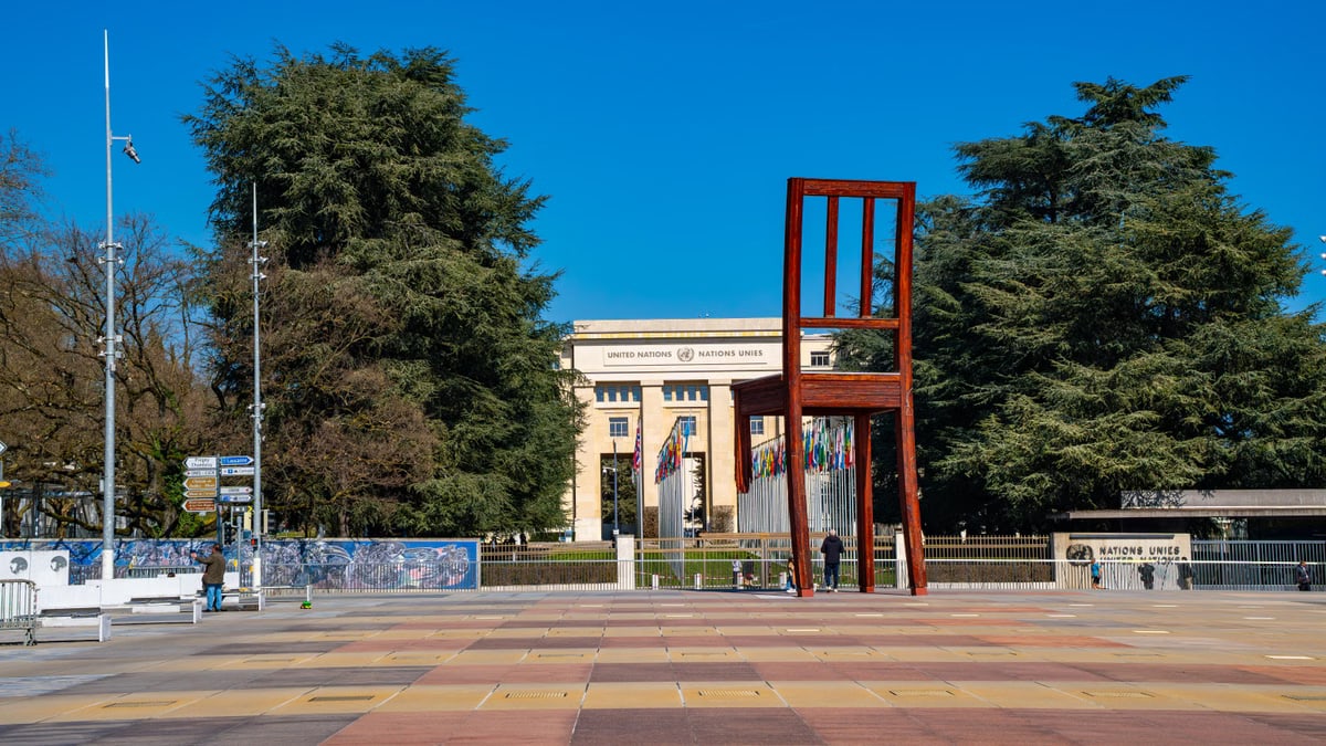 Iconic Broken Chair sculpture near UN building in Geneva.